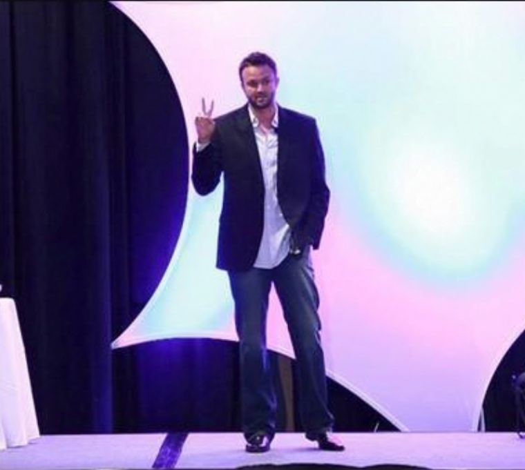 Jimmy Davis speaking on stage