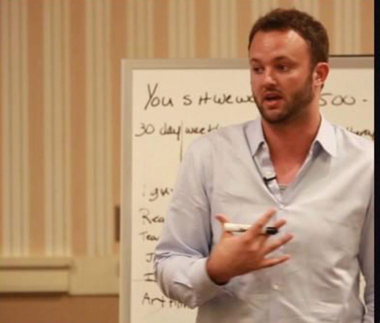 Jimmy Davis teaching at a whiteboard